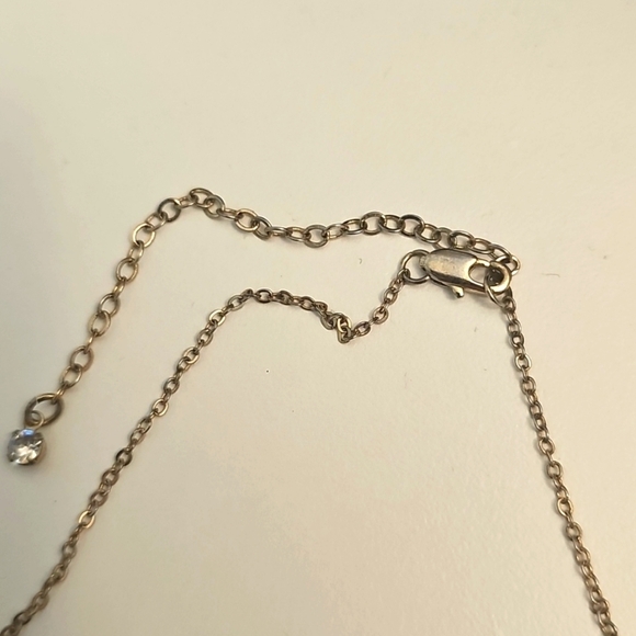 Elegant Gold Necklace with Milk Glass Teardrop Pendant and Circular Accents - Picture 4 of 5